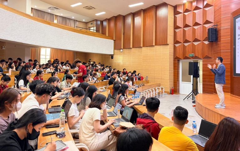 Snr Lecturer Prasart J conducting a talk in Vietnam